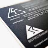 Acorn Archimedes A3010 "hazardous voltages" warning label